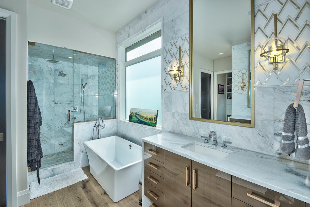 Bathroom - contemporary gray tile medium tone wood floor, brown floor and single-sink bathroom idea in Other with flat-panel cabinets, medium tone wood cabinets, gray walls, an undermount sink, gray countertops, a floating vanity and a hinged shower door