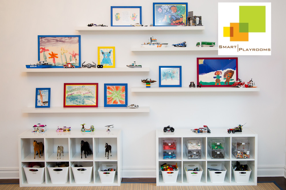 Kids' room - mid-sized modern gender-neutral dark wood floor kids' room idea in New York with white walls