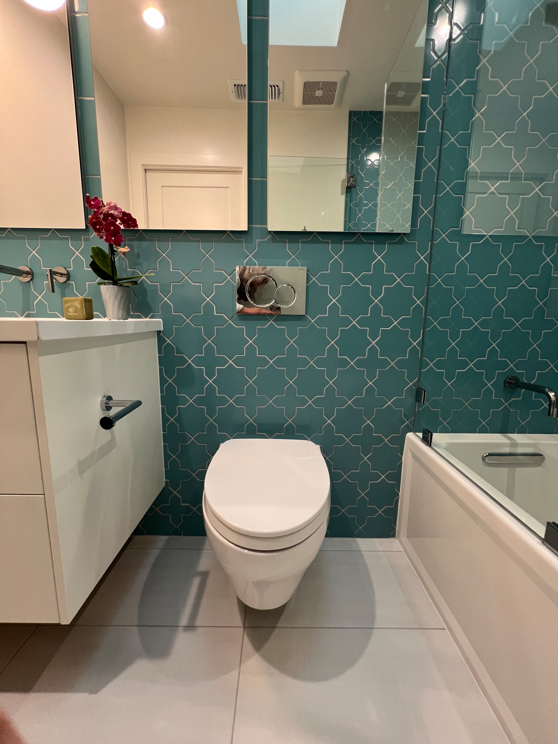 Spaciousness Achieved w/Wall-Mounted Toilet & Vanity