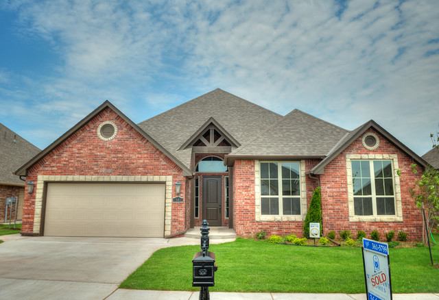  Red  Brick  with White Stone Detail Traditional Exterior  