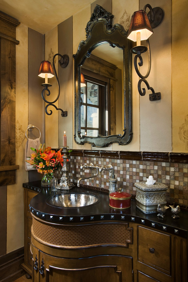 Inspiration for a country powder room in Other with an undermount sink.