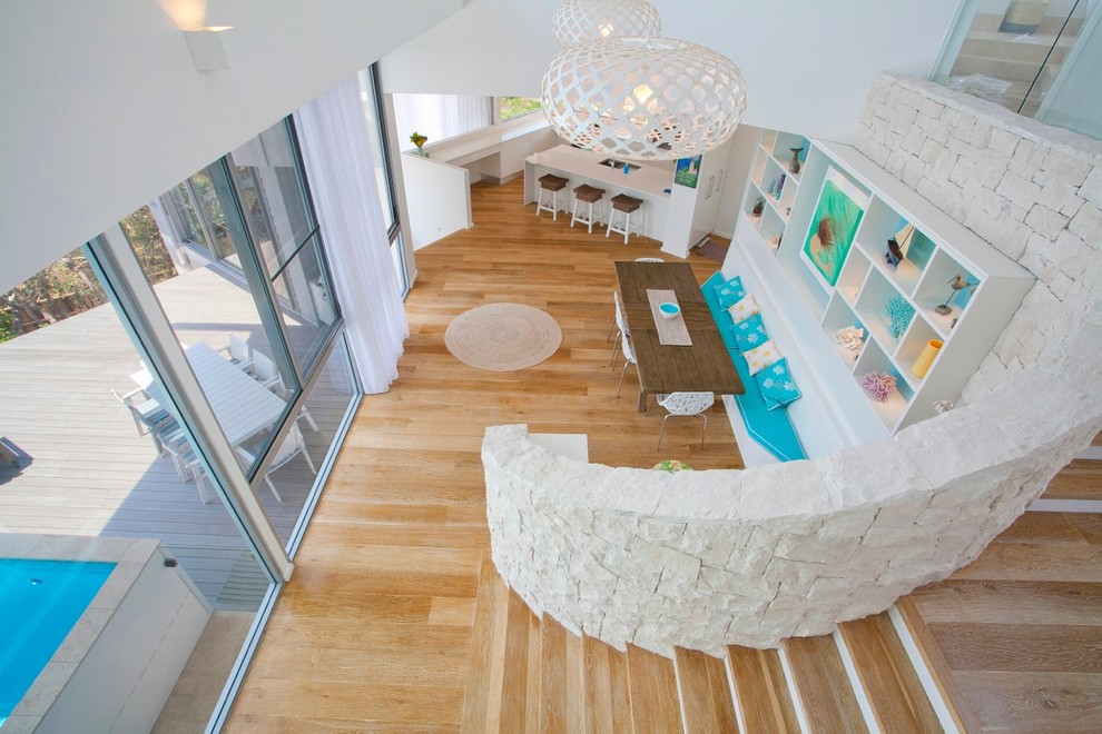 Inspiration for a beach style dining room in Sunshine Coast.