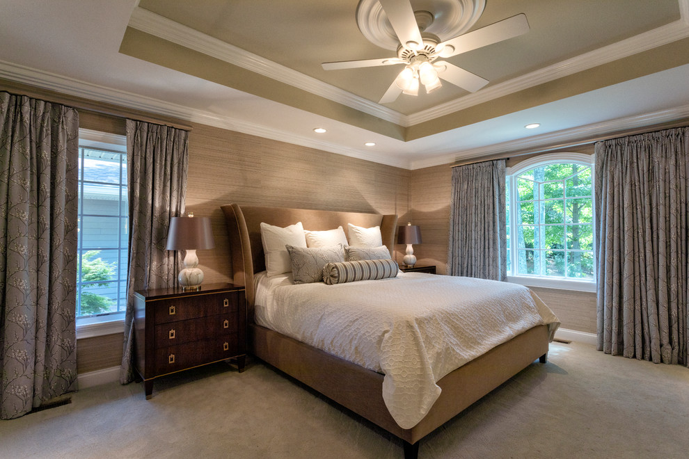 Design ideas for a transitional master bedroom in New York with beige walls, carpet and beige floor.
