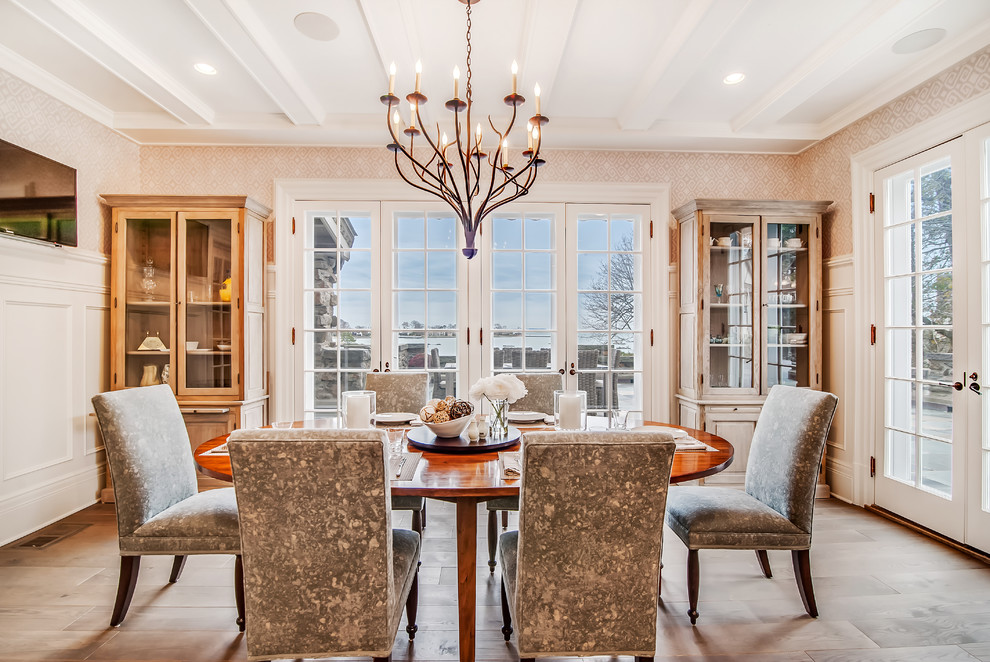 Design ideas for a traditional dining room in New York with limestone floors.