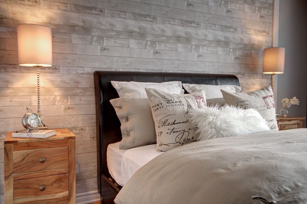 Inspiration for a country bedroom in Montreal with grey walls.