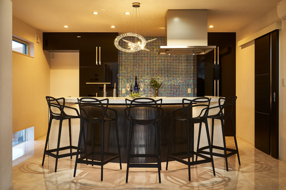 This is an example of a modern seated home bar in Other with an integrated sink, marble floors, beige floor and white benchtop.