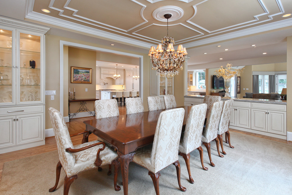 Inspiration for a large traditional separate dining room in Philadelphia with beige walls, light hardwood floors and no fireplace.