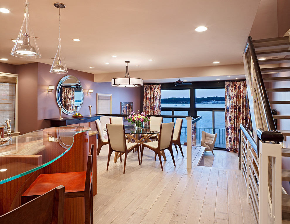 Inspiration for a contemporary eat-in kitchen in DC Metro with glass benchtops.