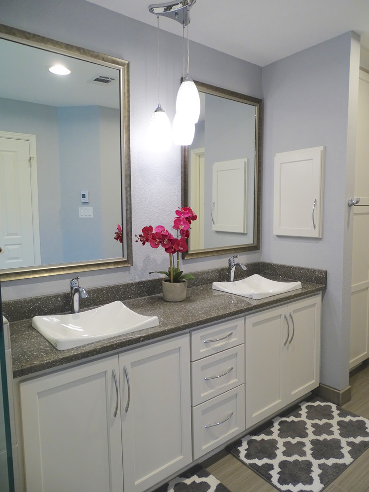 Inspiration for a mid-sized transitional master gray tile and ceramic tile ceramic tile walk-in shower remodel in Austin with white cabinets, purple walls and quartzite countertops