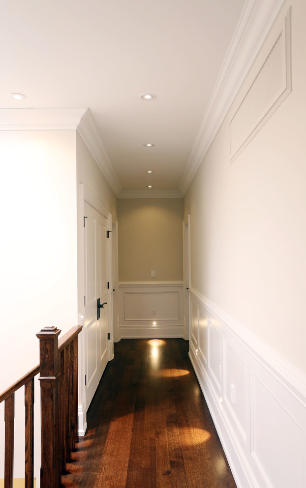 Example of a transitional home design design in Toronto