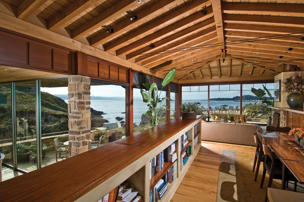 This is an example of a beach style loft-style living room in San Francisco with medium hardwood floors.