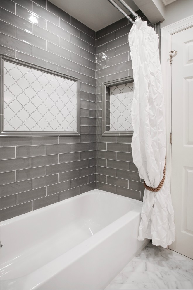 Design ideas for a mid-sized transitional master bathroom in Atlanta with furniture-like cabinets, dark wood cabinets, a freestanding tub, an open shower, a two-piece toilet, white tile, stone tile, beige walls, marble floors, an undermount sink and marble benchtops.