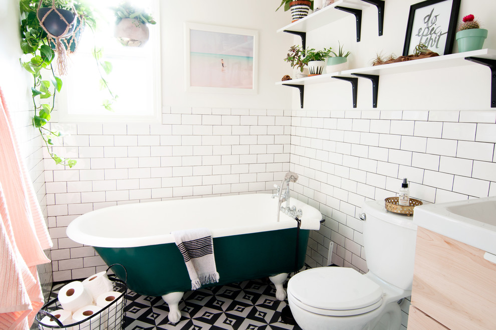 Design ideas for a small eclectic 3/4 bathroom in Los Angeles with a claw-foot tub, a two-piece toilet, black and white tile, white tile, subway tile, white walls and ceramic floors.