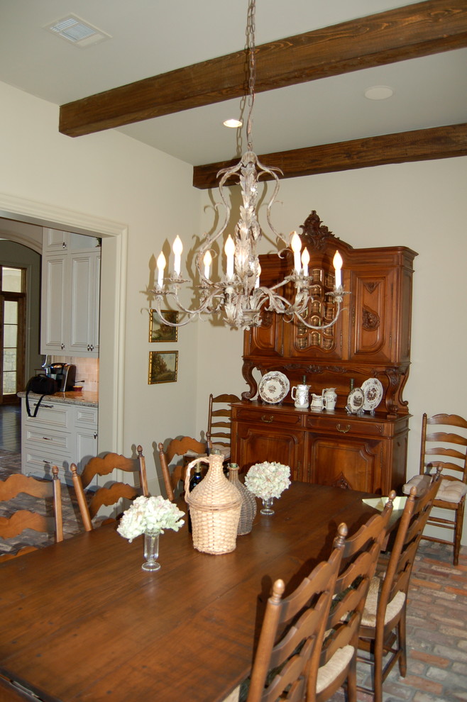 Inspiration for a large traditional dining room in Houston.