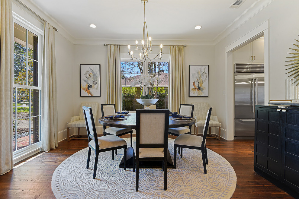 Mid-sized transitional dark wood floor and brown floor dining room photo with white walls