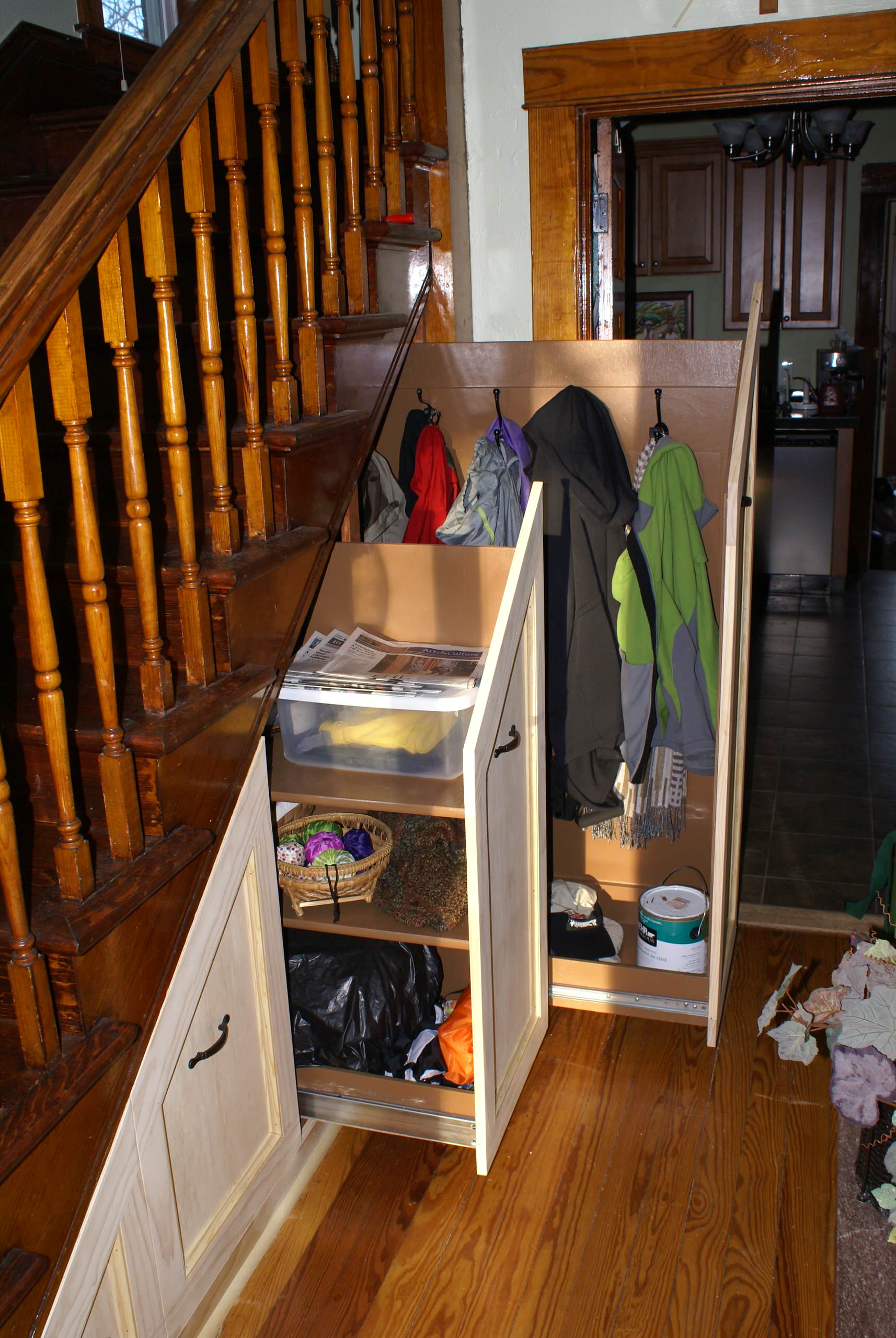 Entry hall closet built under stairs