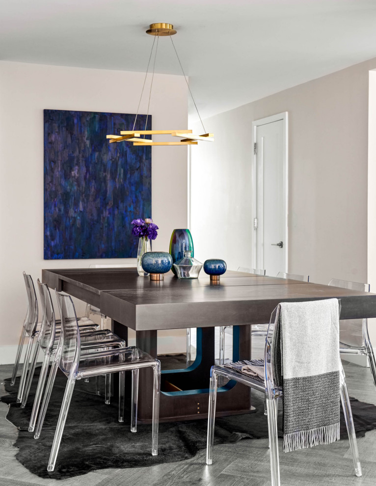 Inspiration for a contemporary dining room in New York with grey walls and grey floor.