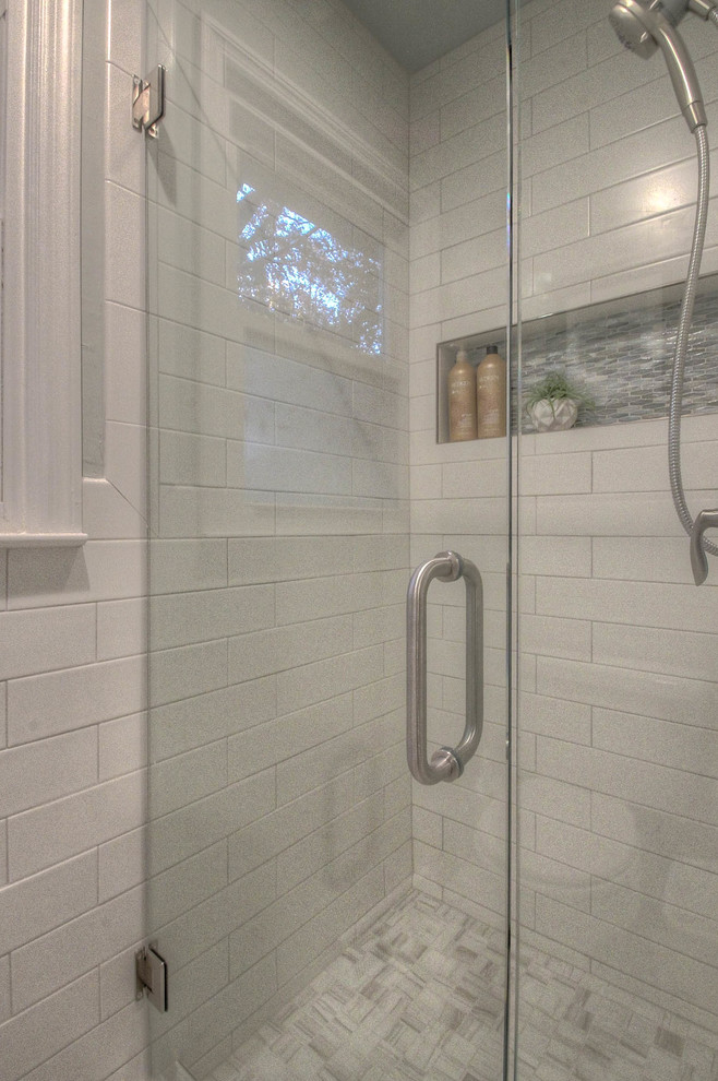 Small transitional master white tile and ceramic tile ceramic tile and white floor home design photo in Houston with a hinged shower door