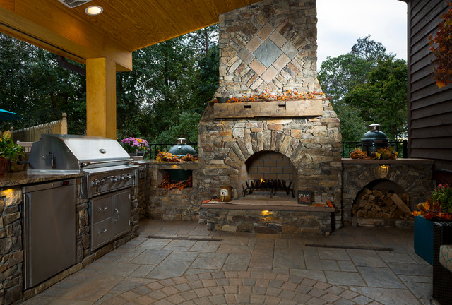 Outdoor fireplace with grill island and big green egg - Rustic - Patio ...