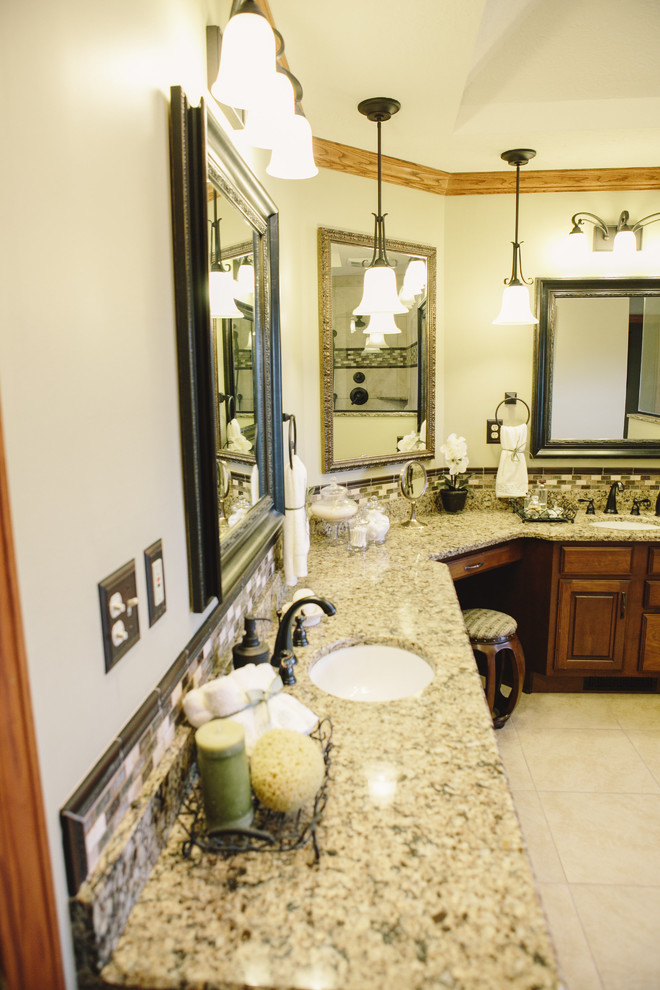Photo of a large traditional master bathroom in Indianapolis with an undermount sink, raised-panel cabinets, dark wood cabinets, engineered quartz benchtops, a freestanding tub, an open shower, a two-piece toilet, beige tile, ceramic tile, beige walls and ceramic floors.