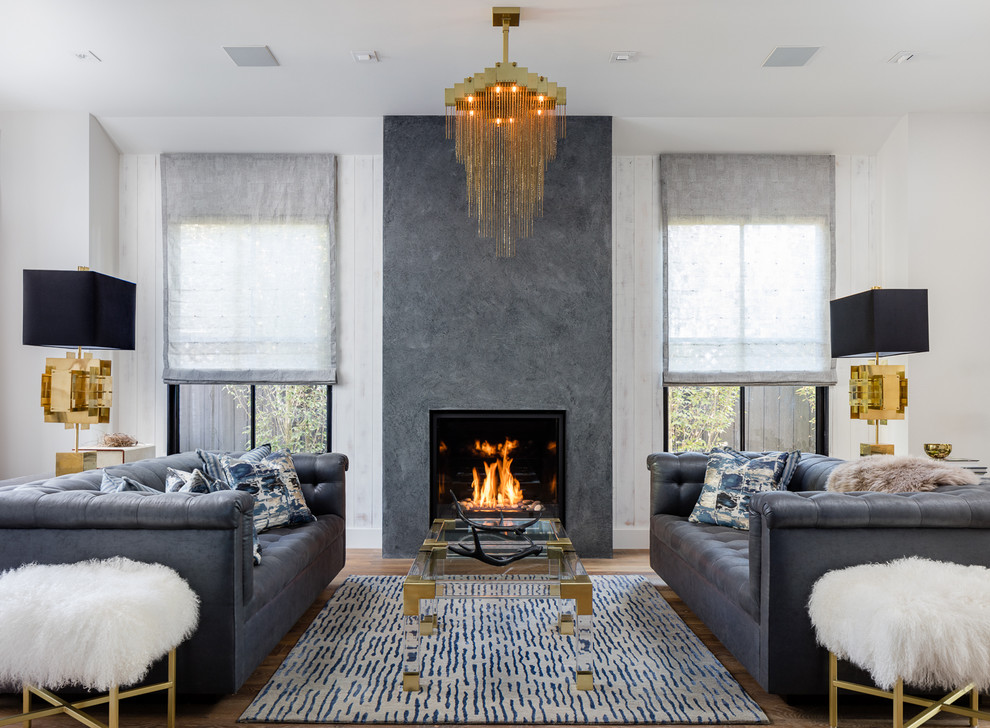 This is an example of a transitional formal living room in San Francisco with a standard fireplace.