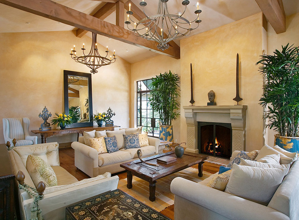 Inspiration for a traditional living room in Santa Barbara with a standard fireplace.