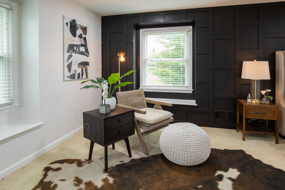 Design ideas for a large transitional master bedroom in Indianapolis with black walls, carpet, no fireplace, beige floor and panelled walls.