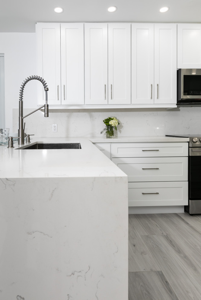 Example of a transitional kitchen design in Miami