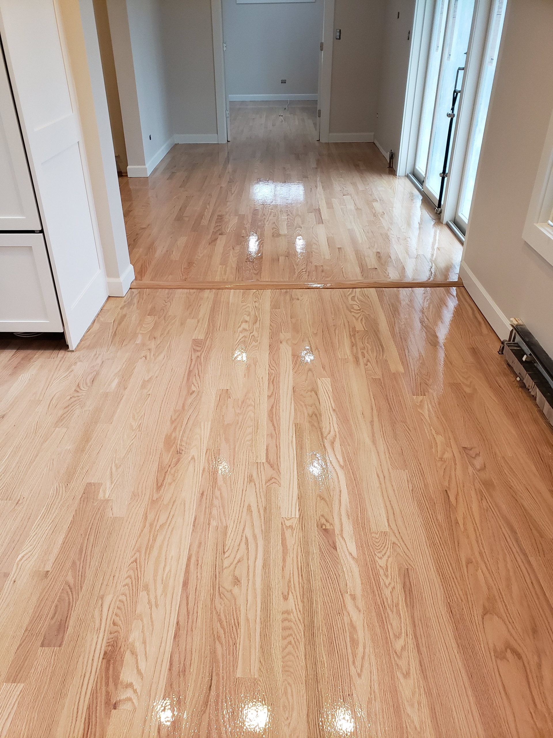Hawthorn Woods,  2 and 1/4 red oak , 3 coats Bona Traffic Hd