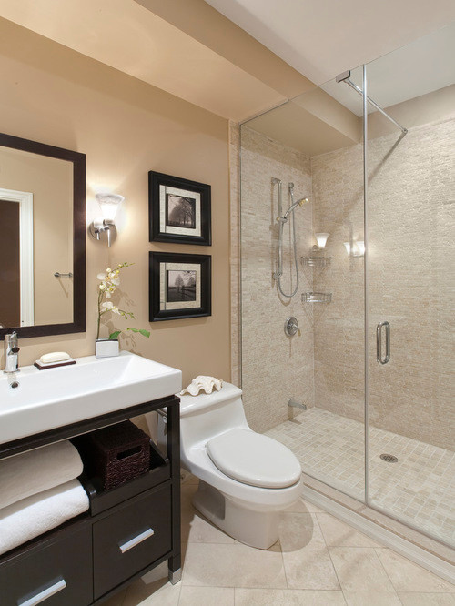 Photo of a mid-sized traditional 3/4 bathroom in New York with open cabinets, dark wood cabinets, a corner tub, a corner shower, a two-piece toilet, terra-cotta tile, orange walls, ceramic floors, an integrated sink, recycled glass benchtops and beige tile.