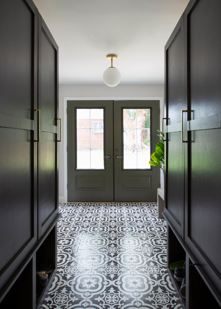Design ideas for a mid-sized midcentury mudroom in DC Metro with porcelain floors, a double front door and a glass front door.