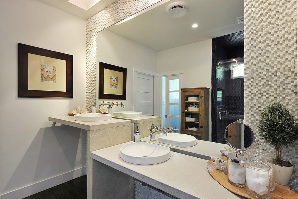 Photo of a transitional bathroom in Austin with stone tile.