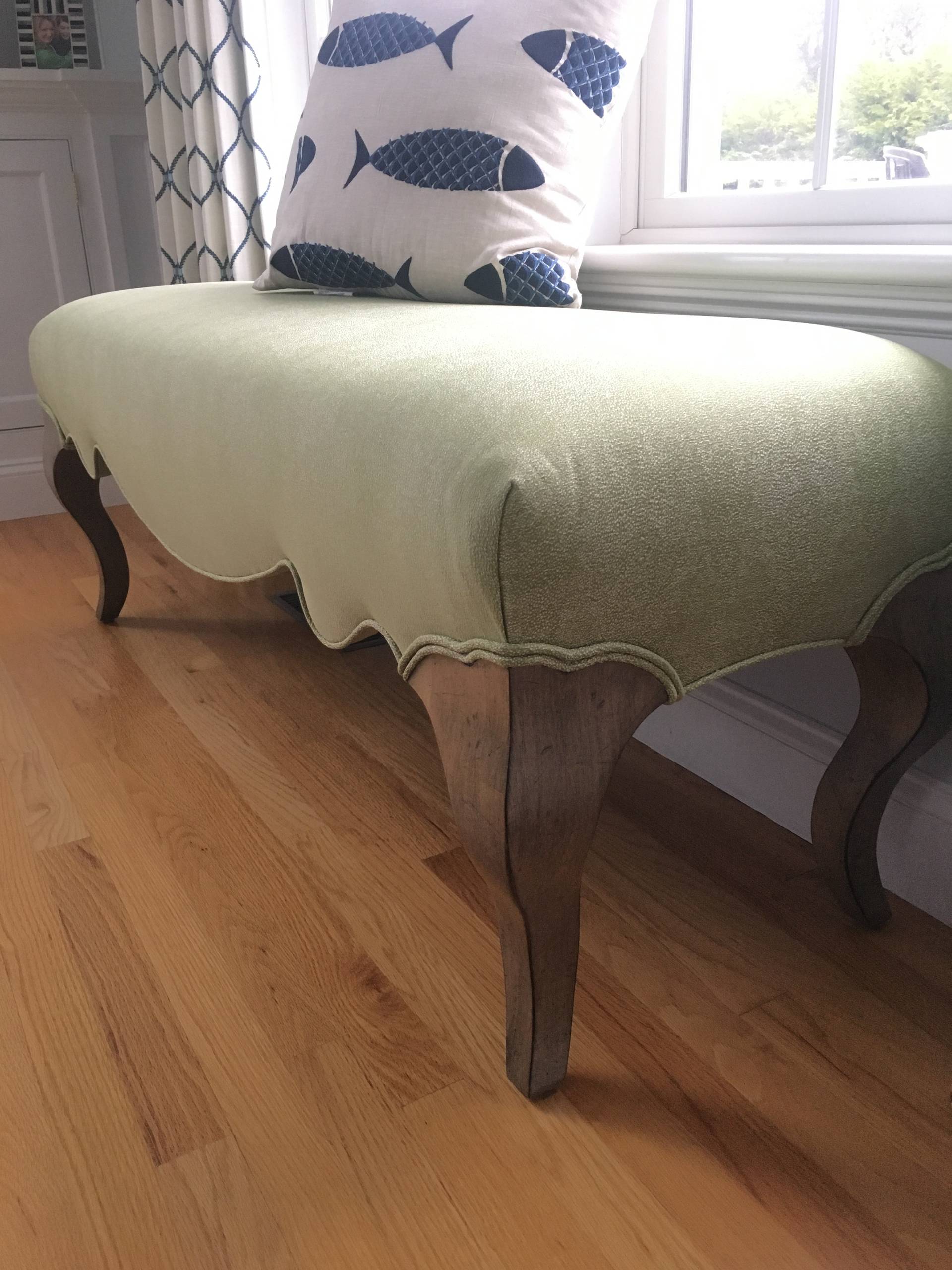 Reupholstered bench used to bring an added pop of color