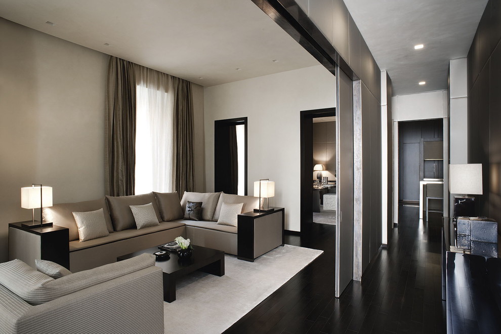 Inspiration for a contemporary living room in Rome with white walls.