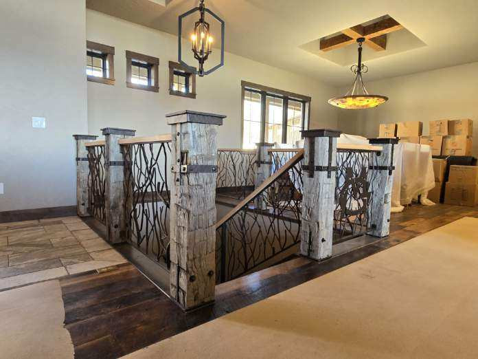 Example of a mountain style home design design in Denver