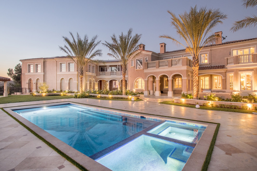 Inspiration for a transitional pool remodel in Orange County