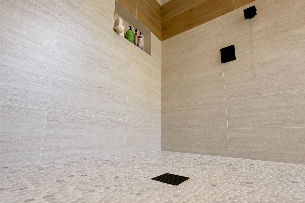 WALK-IN SHOWER WITH NATURAL STONE-LOOK TILE