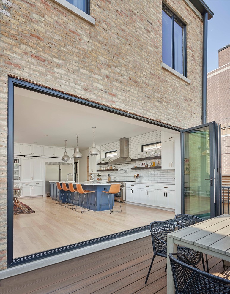 Deck - mid-sized transitional backyard deck idea in Chicago with no cover