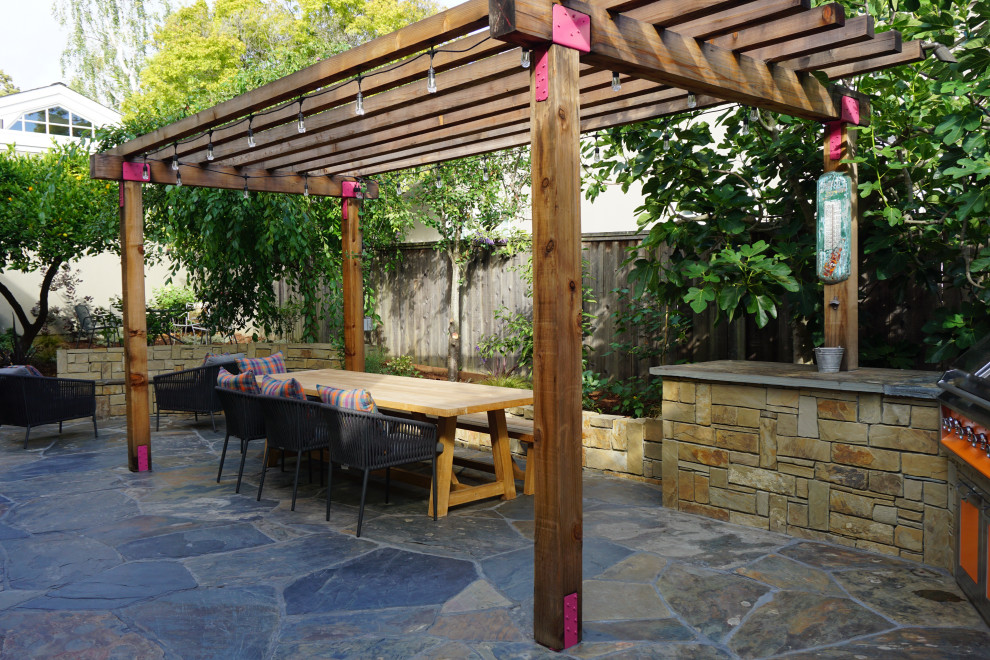 This is an example of a mid-sized eclectic backyard patio in San Francisco.