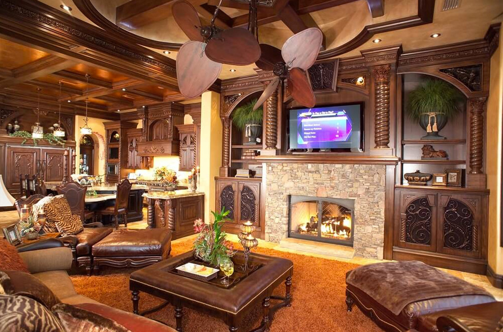 Mid-sized arts and crafts enclosed living room in Denver with brown walls, carpet, a standard fireplace, a stone fireplace surround, a wall-mounted tv and beige floor.