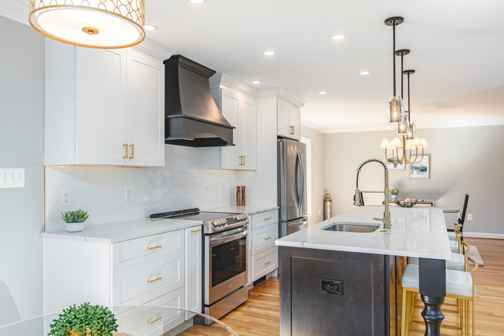 Large arts and crafts single-wall eat-in kitchen in DC Metro with open cabinets, black cabinets and with island.
