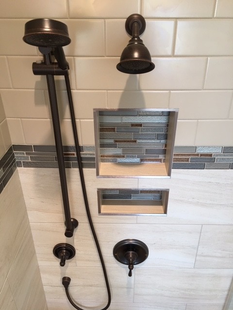 Example of a transitional master beige tile and glass tile ceramic tile home design design in DC Metro with flat-panel cabinets, white cabinets, an undermount tub, an undermount sink and granite countertops
