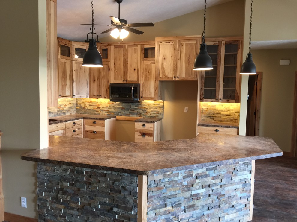 Mountain style home design photo in Omaha