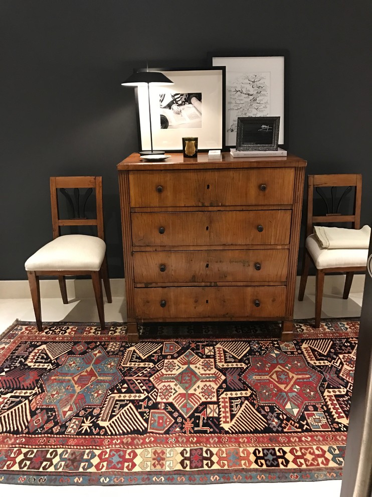 Small eclectic foyer photo with gray walls