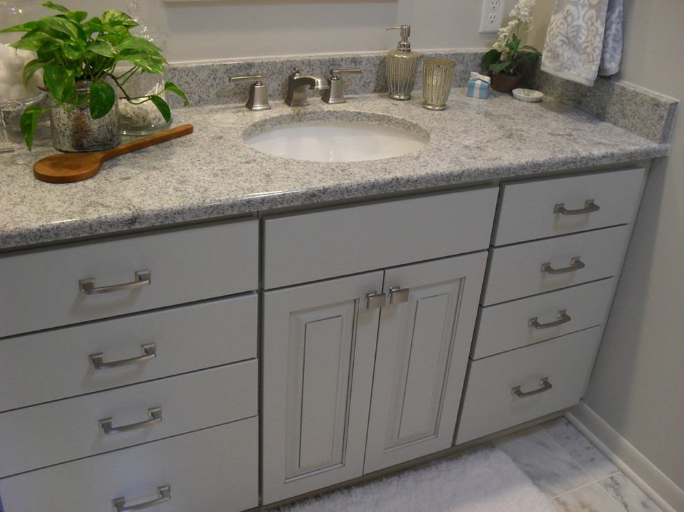 Inspiration for a traditional bathroom in Other with flat-panel cabinets and white cabinets.