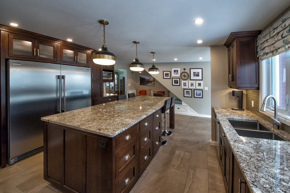 Example of a transitional kitchen design in Toronto