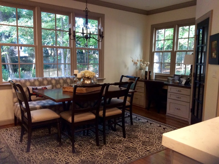 Inspiration for a mid-sized transitional kitchen/dining combo in Raleigh with dark hardwood floors.