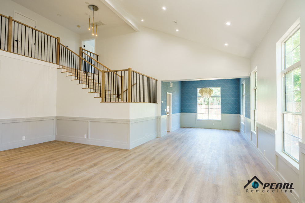 Design ideas for an expansive modern carpeted l-shaped staircase in Other with wood risers, mixed railing and wood walls.