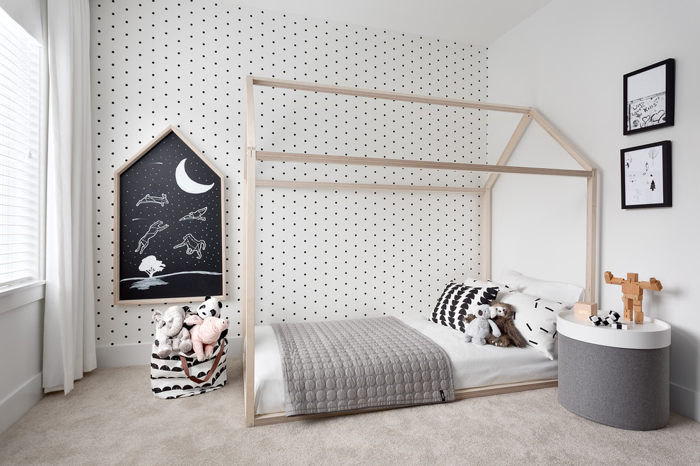 Inspiration for a scandinavian gender-neutral kids' bedroom for kids 4-10 years old in Vancouver with multi-coloured walls, carpet and grey floor.