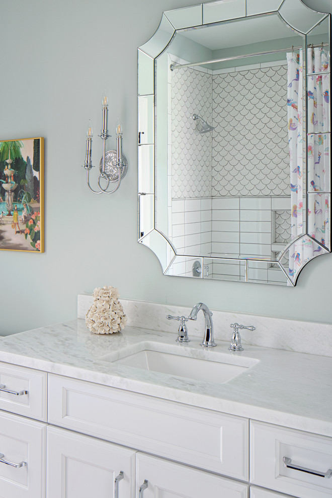 Inspiration for a mid-sized timeless kids' white tile and marble tile porcelain tile, single-sink and white floor bathroom remodel in Richmond with recessed-panel cabinets, white cabinets, a two-piece toilet, blue walls, an undermount sink, marble countertops and a built-in vanity